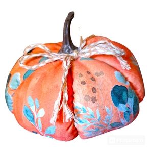 Floral fabric plush pumpkin with stem and raffia bow